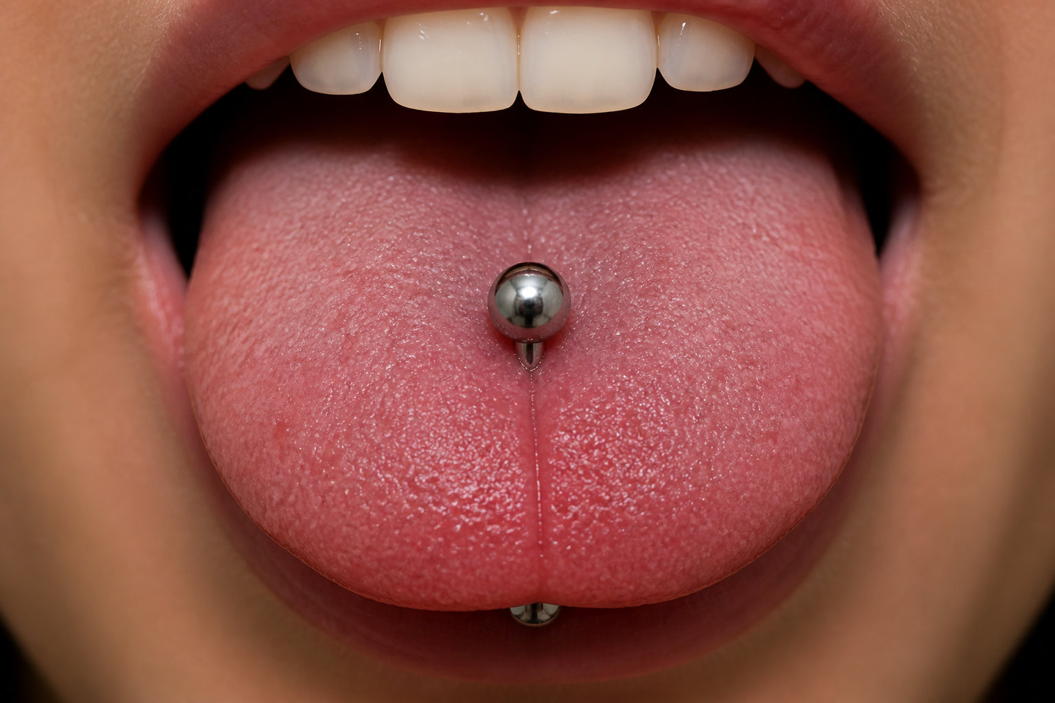 Piercing à la langue : gestion de la douleur et cicatrisation